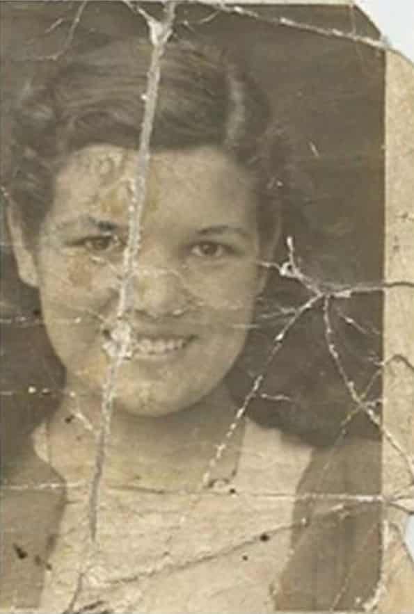 Wrinkled group photo before restoration